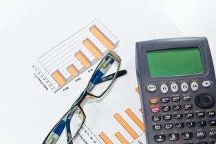 Calculator, Glasses And Graphs