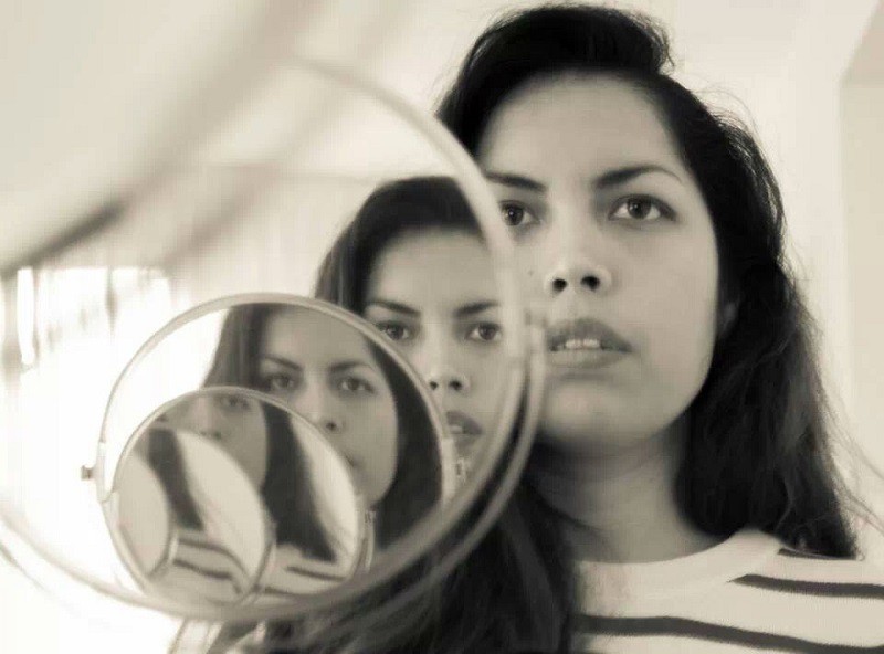 woman at mirror