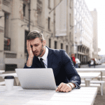 https://www.pexels.com/photo/man-in-black-suit-covering-his-face-with-right-hand-3777554/