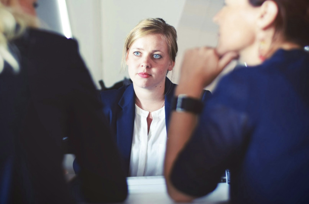 Three business women discussing