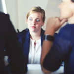 Three business women discussing