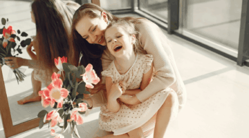 photo-of-mother-and-daughter-sitting-on-the-floor